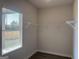 Well-organized walk-in closet featuring wire shelving for efficient storage and a window providing light at 5322 Tolar Rd # 27, South Fulton, GA 30213