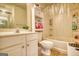 Standard bathroom with a bathtub with a shower, toilet, cabinet and vanity with sink at 2160 Dillard Xing, Tucker, GA 30084