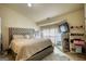 Large main bedroom featuring a TV, plush carpet, and lots of storage space at 2160 Dillard Xing, Tucker, GA 30084