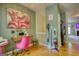 Eclectic office space features bright natural light, fun decor, and wooden floors at 2160 Dillard Xing, Tucker, GA 30084