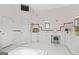 Spacious bathroom features separate vanities, soaking tub, and a glass block window at 7523 Kimberly Lynn Ct, Lithonia, GA 30058
