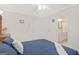 Bedroom with a ceiling fan and access to the bathroom from the bedroom at 7523 Kimberly Lynn Ct, Lithonia, GA 30058