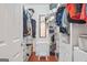 Organized walk-in closet featuring shelving and storage at 7523 Kimberly Lynn Ct, Lithonia, GA 30058