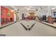 Spacious game room with a pool table and wet bar, perfect for entertaining guests at 7523 Kimberly Lynn Ct, Lithonia, GA 30058