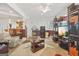 Inviting living room with entertainment area and bar, perfect for relaxing and hosting gatherings at 7523 Kimberly Lynn Ct, Lithonia, GA 30058