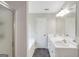 Bathroom boasts double vanity, glass shower, and large soaking tub at 90 Heatherstone Way, Covington, GA 30016