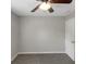 Bedroom featuring a ceiling fan, neutral walls, and carpeted flooring at 90 Heatherstone Way, Covington, GA 30016