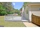 Wide view of the spacious deck in the backyard of the home, perfect for outdoor lounging and entertainment at 15 Riverside Pkwy, Sharpsburg, GA 30277