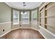 Cozy dining area featuring wood floors, lots of natural light and wainscoting at 15 Riverside Pkwy, Sharpsburg, GA 30277