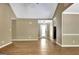 Open concept living space with vaulted ceiling and easy access to other parts of the home at 15 Riverside Pkwy, Sharpsburg, GA 30277