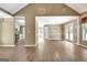 Spacious living room with vaulted ceiling, open layout, and access to the kitchen and dining areas at 15 Riverside Pkwy, Sharpsburg, GA 30277
