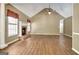 Expansive living room with vaulted ceiling, fireplace, and ample space for seating and decor at 15 Riverside Pkwy, Sharpsburg, GA 30277
