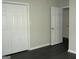 Bedroom with closet and door to another room at 214 Oak Cir, Stockbridge, GA 30281