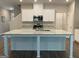 Bright kitchen featuring granite countertops, a center island, and stainless steel appliances at 6398 Lanier Harbor Lndg, Buford, GA 30518