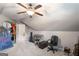 Cozy upstairs bonus room offers carpet and plenty of space for many activities at 68 Timber Creek Estates Dr, Sharpsburg, GA 30277