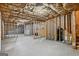 Unfinished basement with exposed wood framing and insulation, offering potential for customization at 5760 Winding Lakes Dr, Cumming, GA 30028