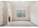 Spacious bedroom with large window overlooking a wooded landscape at 5760 Winding Lakes Dr, Cumming, GA 30028
