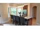 Lovely kitchen featuring stainless steel appliances, granite countertops and bay windows providing plenty of natural light at 5760 Winding Lakes Dr, Cumming, GA 30028