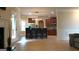 Open-concept kitchen with large island, granite countertops, stainless steel appliances and eat in breakfast area at 5760 Winding Lakes Dr, Cumming, GA 30028