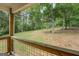 View from porch of backyard with grass and trees at 4979 Snook Thompson Se Rd, Oxford, GA 30054