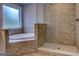 Close up of a gorgeous bathroom with a stand-alone shower, soaking tub, and tiled floors at 4979 Snook Thompson Se Rd, Oxford, GA 30054