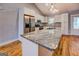 Kitchen with granite counters, stainless steel appliances, and lots of cabinet space at 4979 Snook Thompson Se Rd, Oxford, GA 30054