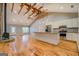 Open concept living area featuring a kitchen with an island and fireplace at 4979 Snook Thompson Se Rd, Oxford, GA 30054