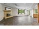 Finished basement with tile flooring, fireplace, and walkout access, perfect for entertaining and relaxing at 3863 Dundee Ne Dr, Roswell, GA 30075