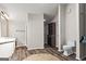Unique bathroom features round flooring, dual vanity, and a large closet for added convenience at 3863 Dundee Ne Dr, Roswell, GA 30075
