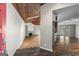Open-concept entryway showcasing hardwood floors, wood ceiling, and living spaces at 3863 Dundee Ne Dr, Roswell, GA 30075