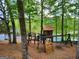 Community playground for with climbing wall, swings, rope bridge, and look-out at 3863 Dundee Ne Dr, Roswell, GA 30075