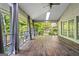 This sunroom offers a bright space with picturesque views, perfect for relaxation and enjoyment at 3863 Dundee Ne Dr, Roswell, GA 30075