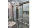 Bathroom showcasing a stand-up shower with sleek marble tiling at 3969 W Hilda Cir, Decatur, GA 30035