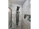 Shower boasts a modern shower system and tiled alcove at 3969 W Hilda Cir, Decatur, GA 30035