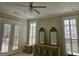 Spacious bedroom with double doors, ceiling fan and ample natural light at 101 Eadestowne Way, Peachtree City, GA 30269