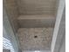 Contemporary shower featuring a mosaic tile floor and built-in bench at 101 Eadestowne Way, Peachtree City, GA 30269