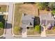 A top-down aerial image of a property with a corner lot and grass lawn at 237 Highcrest Dr, Acworth, GA 30101