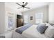 Serene bedroom with plush carpeting, a cozy bed, and view to the outdoor area offers a relaxing and comfortable retreat at 237 Highcrest Dr, Acworth, GA 30101