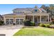 Charming two-story home featuring a welcoming front porch, three-car garage and manicured landscaping at 237 Highcrest Dr, Acworth, GA 30101