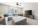 Cozy living room with a comfortable sectional sofa, large TV, and neutral decor creates a welcoming entertainment space at 237 Highcrest Dr, Acworth, GA 30101