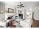 Bright living room with a fireplace, hardwood floors, and comfortable seating arrangements at 237 Highcrest Dr, Acworth, GA 30101