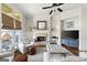 Inviting living room featuring a fireplace, large windows, and stylish furniture at 237 Highcrest Dr, Acworth, GA 30101