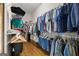 Spacious walk-in closet with organized shelving and hanging space provides ample storage for all your wardrobe needs at 237 Highcrest Dr, Acworth, GA 30101