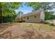 Beautiful backyard showcasing the deck, grill area, and a well-maintained lawn perfect for outdoor activities at 372 River Point Dr, Mcdonough, GA 30252