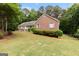 A view of the front of a ranch home with brick and vinyl siding at 372 River Point Dr, Mcdonough, GA 30252