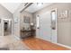 Bright foyer with wood floors and neutral decor sets a welcoming tone in this beautifully maintained home at 372 River Point Dr, Mcdonough, GA 30252