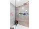 Recently updated shower with mosaic tile accents and built-in storage niche at 372 River Point Dr, Mcdonough, GA 30252