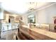 View of open floor plan with dining area and kitchen bar with seating at 5327 David Se Cir, Covington, GA 30014