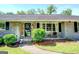 Charming front porch with decorative wreath and seating, offering curb appeal and a cozy welcome at 5327 David Se Cir, Covington, GA 30014