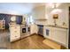 Updated kitchen with stainless steel appliances, granite countertops, and hardwood floors at 5327 David Se Cir, Covington, GA 30014